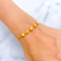 lavish-textured-22k-gold-orb-bolo-bracelet
