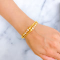 Glistening Striped 22k Gold Orb Bangle Bracelet 