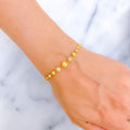 Sophisticated Curved Orb 22k Gold Bracelet