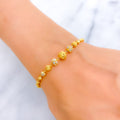 Sophisticated Curved Orb 22k Gold Bracelet