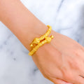 textured-festive-22k-gold-pipe-bangle