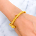 textured-festive-22k-gold-pipe-bangle