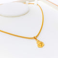 Radiant Reflective 22k Gold Ganesh Pendant