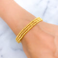 Simmering Striped 22k Gold Bangle Bracelet 