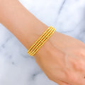 Bold Four Layered 22k Gold Bangle Bead Bracelet