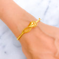 delicate-twisted-leaf-22k-gold-bangle-bracelet
