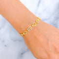 Two-Tone Heart Accented CZ 22k Gold Bracelet 