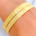 Magnificent Dual Finish 22k Gold Geometric Bangle Pair