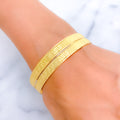 Magnificent Dual Finish 22k Gold Geometric Bangle Pair