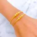 Stately Striped 22k Gold Bangle Bracelet Pair 