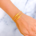 Palatial Triple Orb 22k Gold Bangle Bracelet Pair 