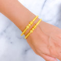 Unique Radiant 22k Gold Pipe Bangles