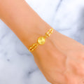 Radiant Circular 21k Gold Bracelet 