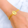 Glistening Oval 21k Gold Coin Bracelet 