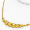 luminescent-wavy-22k-gold-necklace