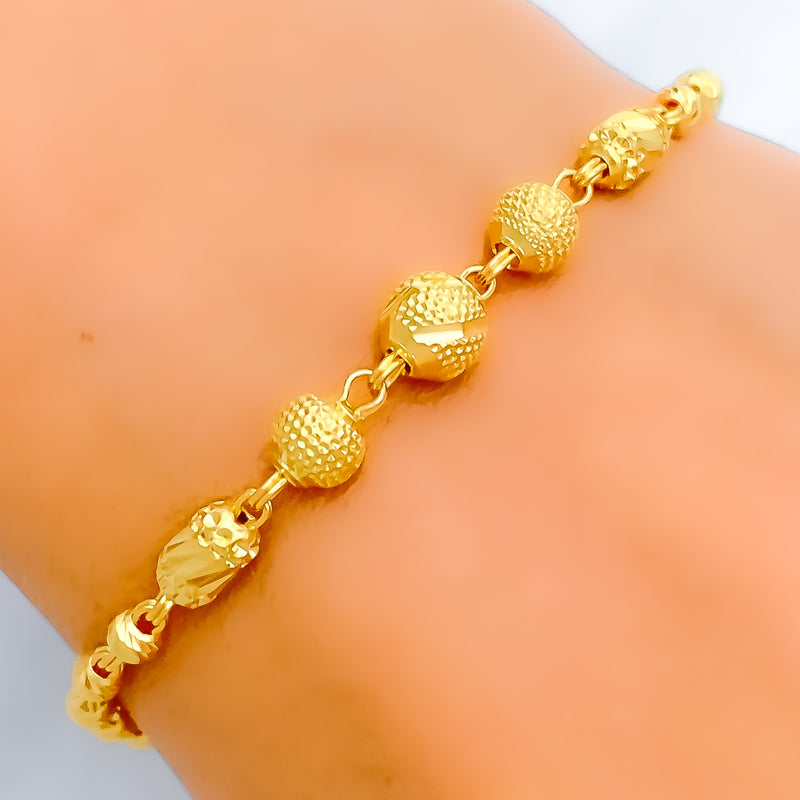 Timeless Striped Orb 22k Gold Bracelet