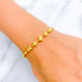 Timeless Striped Orb 22k Gold Bracelet