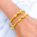 Delightful Flower Accented 22k Gold Pipe Bangles 