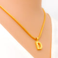 radiant-adorned-22k-gold-letter-pendant