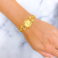 Floral Sand Finished 21k Gold Coin Bracelet