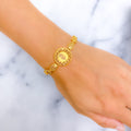 Majestic Feather Adorned 21k Gold Coin Bracelet 