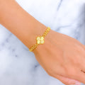 elevated-fancy-22k-gold-clover-bracelet
