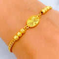 Timeless Bright Oval 21k Gold Bracelet