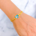 Enameled Heart-Shaped 21k Gold Bracelet