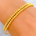 Shimmering Dual Lined Orb 22k Gold Bangle Bracelet 