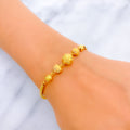 Evergreen Posh 22k Gold Orb Flexi Bangle Bracelet 