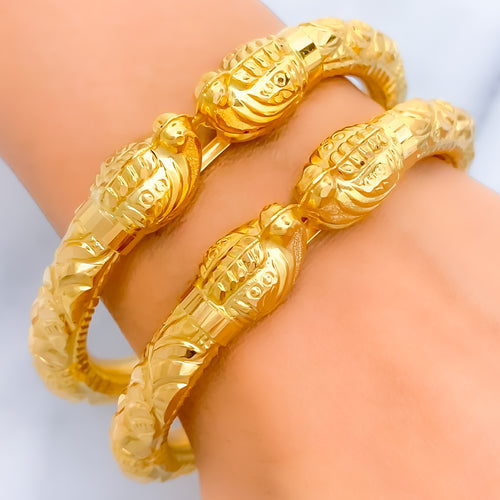 Decorative Elephant Faced 22k Gold Pipe Bangles 