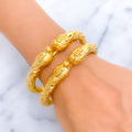 Decorative Elephant Faced 22k Gold Pipe Bangles 