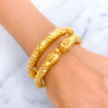 Decorative Elephant Faced 22k Gold Pipe Bangles 