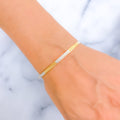 alternating-glistening-two-tone-22k-gold-bangle