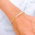 alternating-glistening-two-tone-22k-gold-bangle