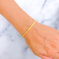 shimmering-zig-zag-22k-gold-bangle