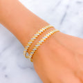 Trendy Two-Tone 22k Gold Bangle Pair