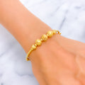 Alternating Floral 22k Gold Bangle Bracelet 
