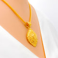 Shiny Striped Leaf Adorned 22k Gold Pendant Set 