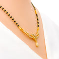 Intricate Wavy 22K Gold CZ Mangal Sutra Necklace Set