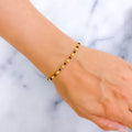 Dainty Alternating 22k Gold Black Bead Bracelet 