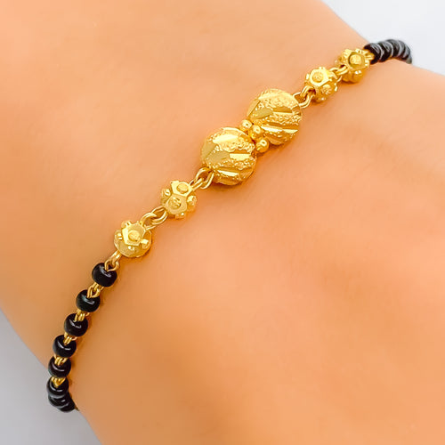 Upscale Twin Orb 22k Gold Black Bead Bracelet 