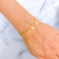 dangling-detailed-22k-gold-charm-bracelet