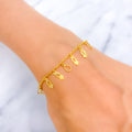 jazzy-chic-22k-gold-charm-bracelet