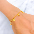 posh-heart-22k-gold-charm-bracelet