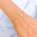 two-tone-fancy-22k-gold-charm-bracelet