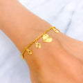 iconic-sparkling-22k-gold-charm-bracelet