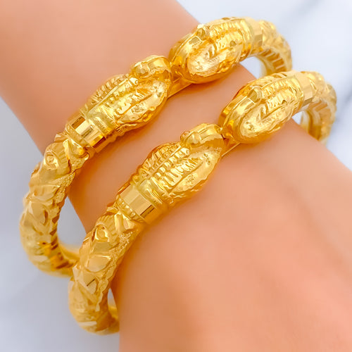 Glistening Elephant Faced 22k Gold Pipe Bangles