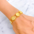 jazzy-shimmering-21k-gold-coin-bracelet