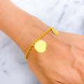 opulent-gleaming-21k-gold-coin-bracelet